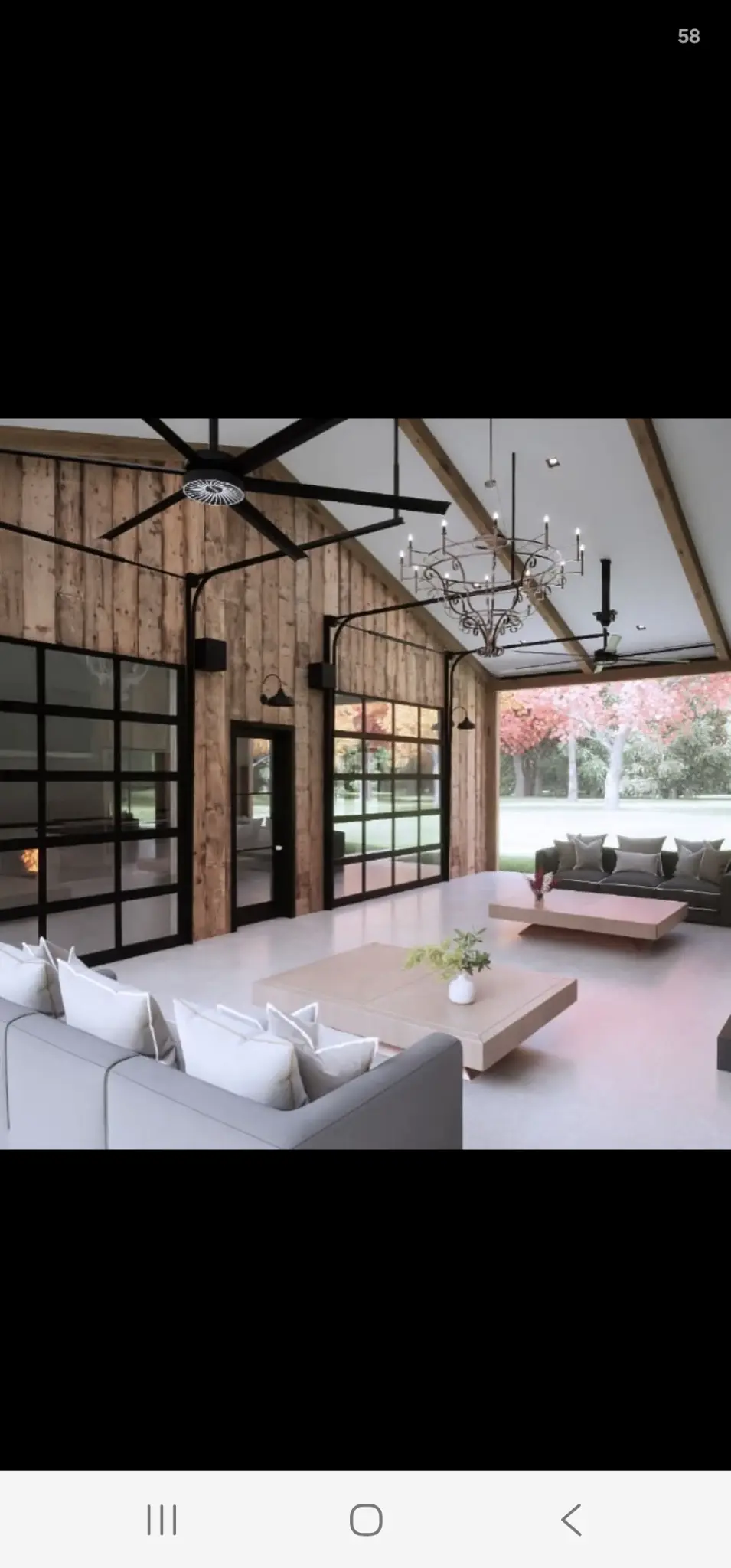 Barndominium interior living space with wood accent walls and open floor plan