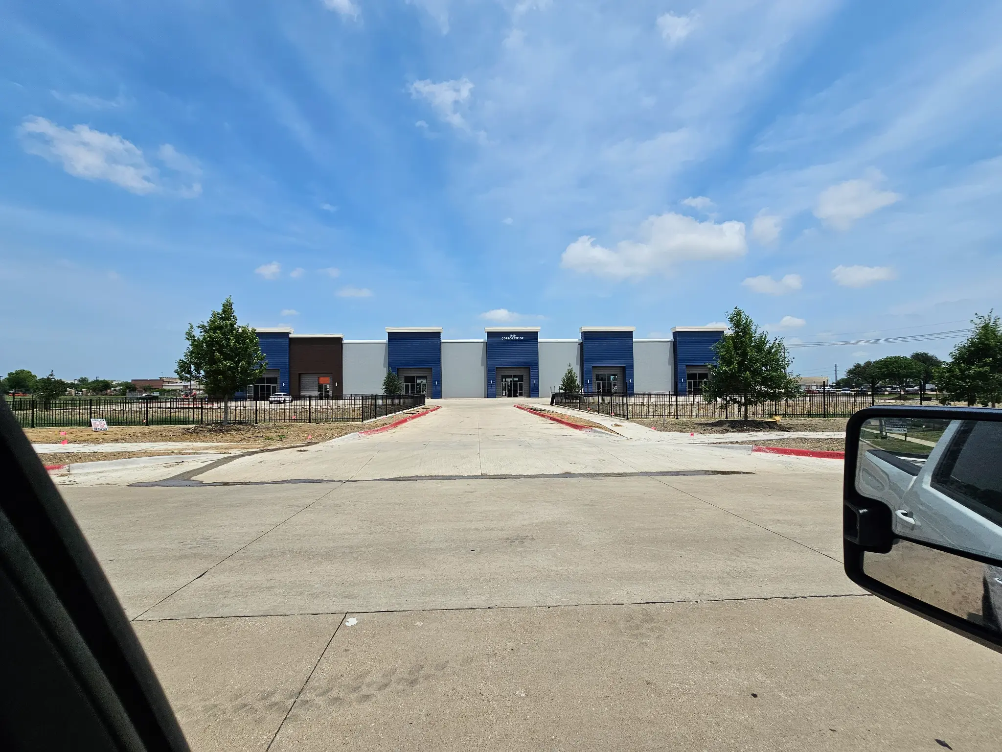 Commercial steel building front elevation wide shot by KC Construction in Central Texas