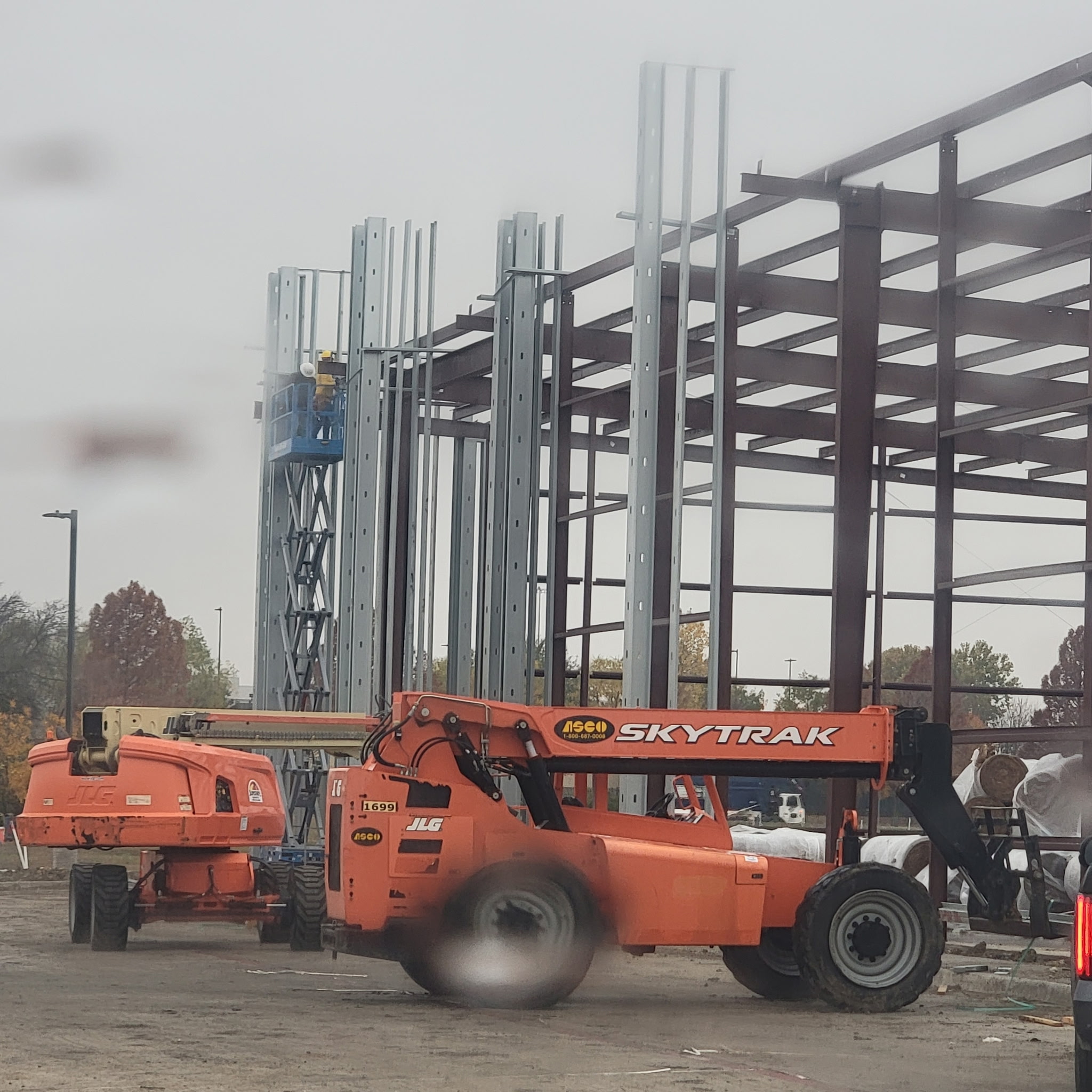 KC Construction crew working on steel frame construction in Central Texas