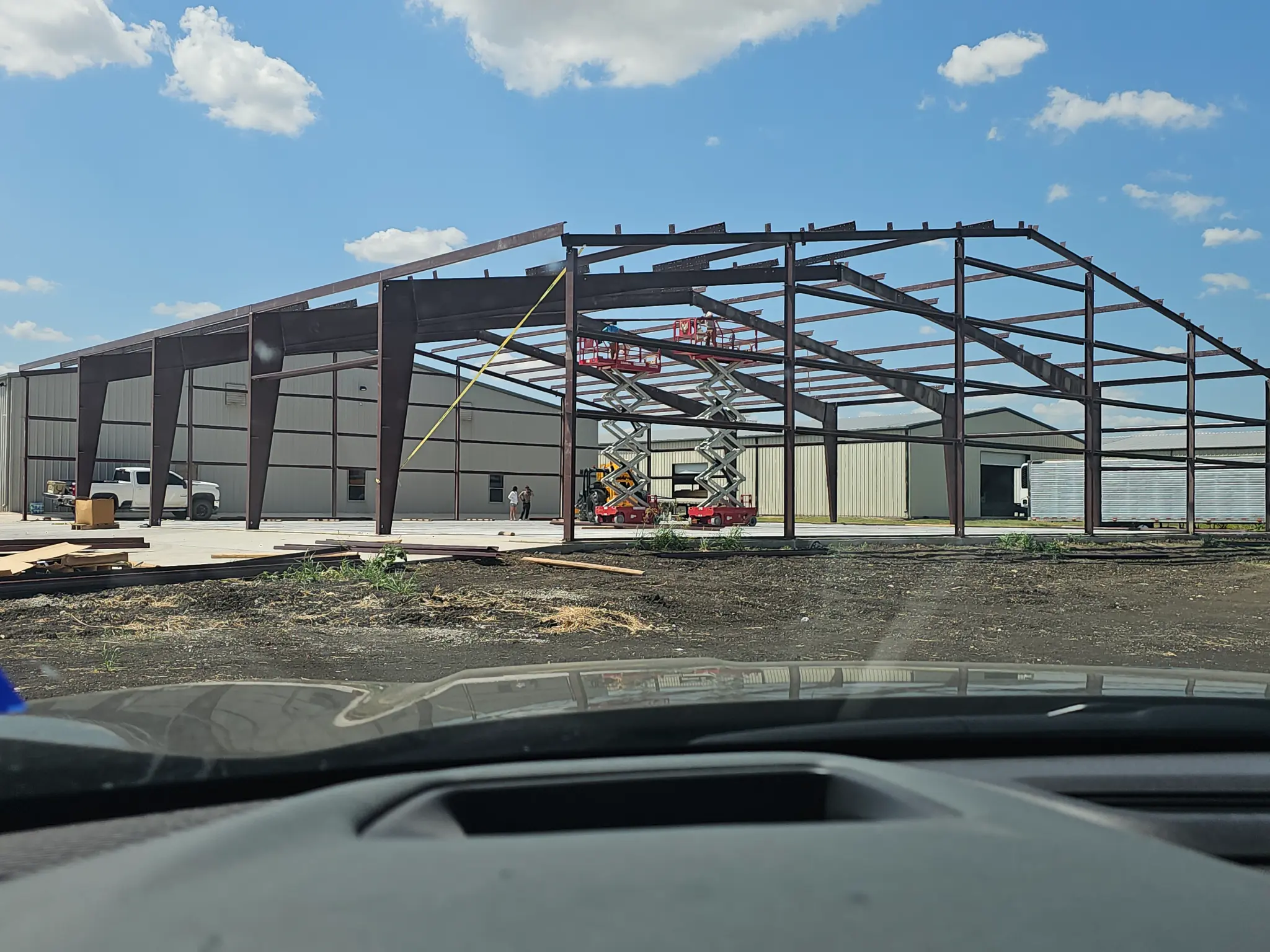 KC Construction crew erecting a steel frame building in Central Texas