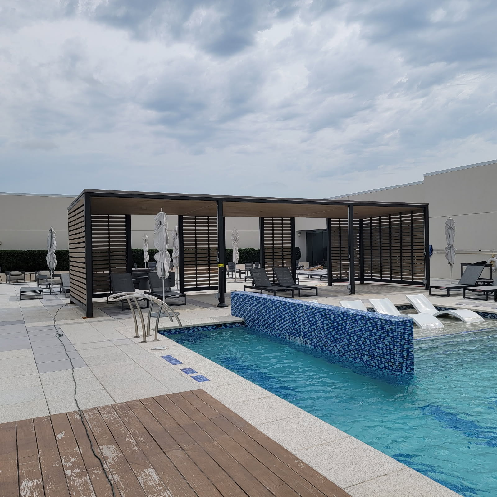 Specialty rooftop pool cabana structure built by KC Construction